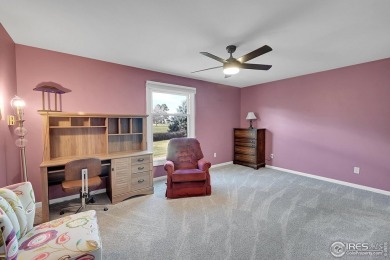 Enjoy easy living in this 2nd floor condo overlooking the on Greeley Country Club in Colorado - for sale on GolfHomes.com, golf home, golf lot