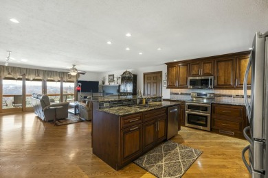 Situated on two massive water view lots in stunning & convenient on Kimberling City Golf Club in Missouri - for sale on GolfHomes.com, golf home, golf lot