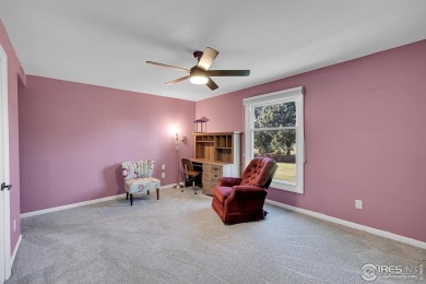 Enjoy easy living in this 2nd floor condo overlooking the on Greeley Country Club in Colorado - for sale on GolfHomes.com, golf home, golf lot