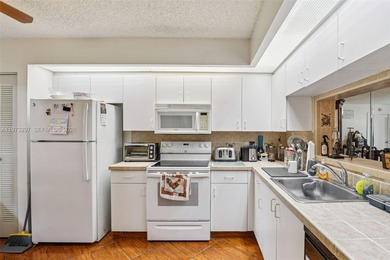 Welcome to this inviting FIRST-FLOOR 1 bedroom, 1.5 bath condo on Flamingo Lakes Country Club in Florida - for sale on GolfHomes.com, golf home, golf lot