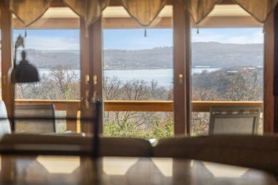 Situated on two massive water view lots in stunning & convenient on Kimberling City Golf Club in Missouri - for sale on GolfHomes.com, golf home, golf lot