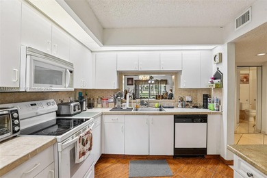 Welcome to this inviting FIRST-FLOOR 1 bedroom, 1.5 bath condo on Flamingo Lakes Country Club in Florida - for sale on GolfHomes.com, golf home, golf lot