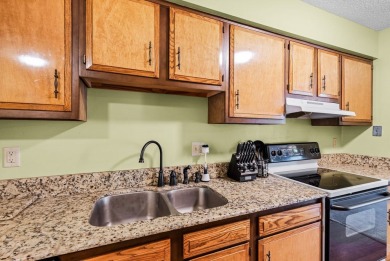 Beautiful townhouse with stunning views of the 18th hole on the on Diamondhead Country Club in Mississippi - for sale on GolfHomes.com, golf home, golf lot