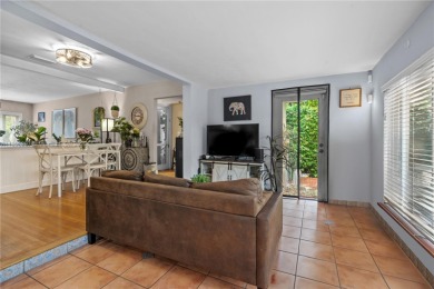 Welcome to an elegant sanctuary nestled beneath the majestic on Granada Golf Club in Florida - for sale on GolfHomes.com, golf home, golf lot