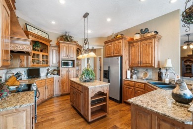 Welcome to 4310 Buttonwood Drive--a stunning all-brick and stone on Fremont Hills Country Club in Missouri - for sale on GolfHomes.com, golf home, golf lot