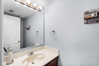 Beautiful townhouse with stunning views of the 18th hole on the on Diamondhead Country Club in Mississippi - for sale on GolfHomes.com, golf home, golf lot