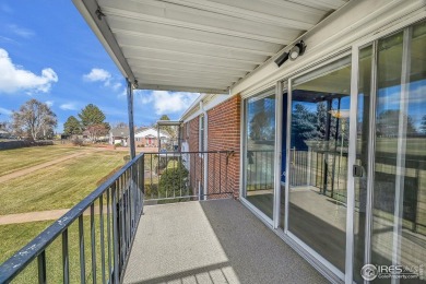 Enjoy easy living in this 2nd floor condo overlooking the on Greeley Country Club in Colorado - for sale on GolfHomes.com, golf home, golf lot