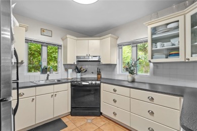 Welcome to an elegant sanctuary nestled beneath the majestic on Granada Golf Club in Florida - for sale on GolfHomes.com, golf home, golf lot