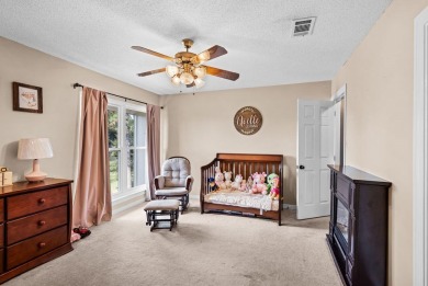 Beautiful townhouse with stunning views of the 18th hole on the on Diamondhead Country Club in Mississippi - for sale on GolfHomes.com, golf home, golf lot