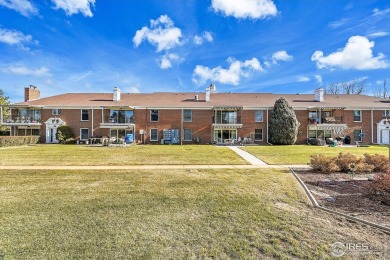 Enjoy easy living in this 2nd floor condo overlooking the on Greeley Country Club in Colorado - for sale on GolfHomes.com, golf home, golf lot