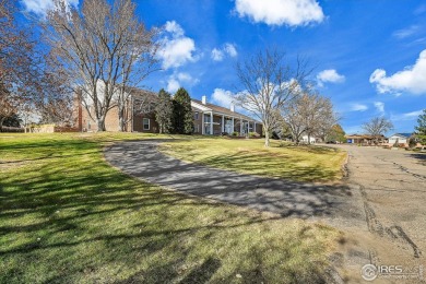 Enjoy easy living in this 2nd floor condo overlooking the on Greeley Country Club in Colorado - for sale on GolfHomes.com, golf home, golf lot