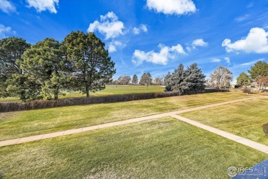 Enjoy easy living in this 2nd floor condo overlooking the on Greeley Country Club in Colorado - for sale on GolfHomes.com, golf home, golf lot