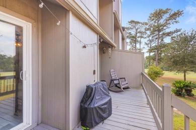 Beautiful townhouse with stunning views of the 18th hole on the on Diamondhead Country Club in Mississippi - for sale on GolfHomes.com, golf home, golf lot