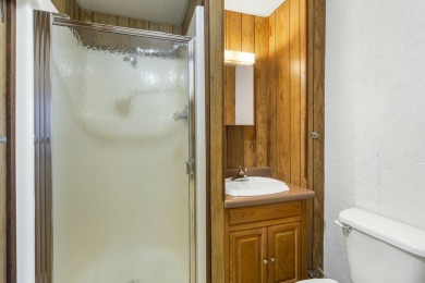 Situated on two massive water view lots in stunning & convenient on Kimberling City Golf Club in Missouri - for sale on GolfHomes.com, golf home, golf lot