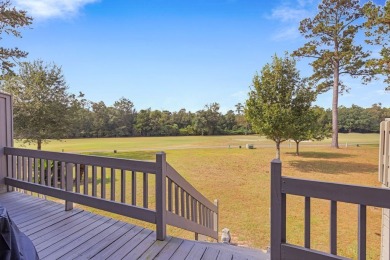 Beautiful townhouse with stunning views of the 18th hole on the on Diamondhead Country Club in Mississippi - for sale on GolfHomes.com, golf home, golf lot