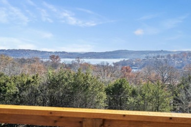 Situated on two massive water view lots in stunning & convenient on Kimberling City Golf Club in Missouri - for sale on GolfHomes.com, golf home, golf lot