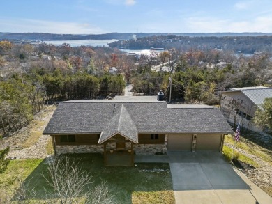 Situated on two massive water view lots in stunning & convenient on Kimberling City Golf Club in Missouri - for sale on GolfHomes.com, golf home, golf lot