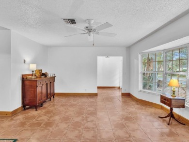 Imagine a Florida home with a sunny, tropical vibe, infused with on Lakeview Golf Club in Florida - for sale on GolfHomes.com, golf home, golf lot