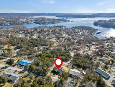 Situated on two massive water view lots in stunning & convenient on Kimberling City Golf Club in Missouri - for sale on GolfHomes.com, golf home, golf lot