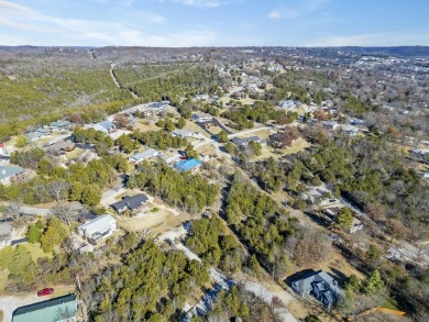 Situated on two massive water view lots in stunning & convenient on Kimberling City Golf Club in Missouri - for sale on GolfHomes.com, golf home, golf lot