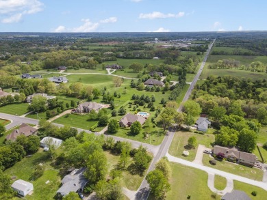 Welcome to 4310 Buttonwood Drive--a stunning all-brick and stone on Fremont Hills Country Club in Missouri - for sale on GolfHomes.com, golf home, golf lot