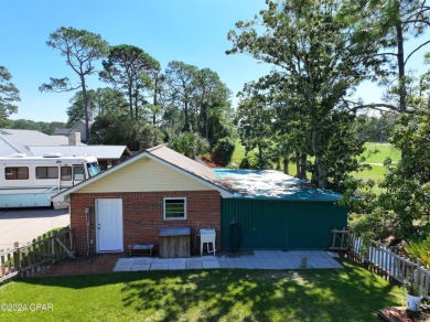 Wow! It is a custom built, one owner brick home on a large lot on Holiday Golf Club in Florida - for sale on GolfHomes.com, golf home, golf lot