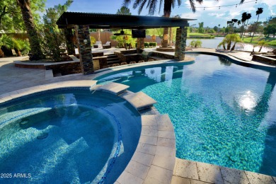 This tropical backyard oasis is a true showstopper! An oversized on Kokopelli Golf Course in Arizona - for sale on GolfHomes.com, golf home, golf lot