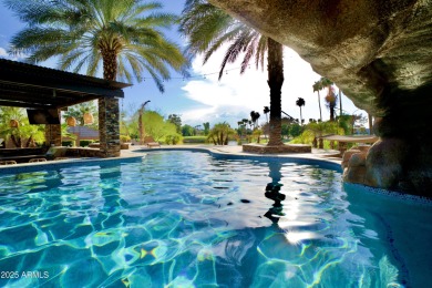 This tropical backyard oasis is a true showstopper! An oversized on Kokopelli Golf Course in Arizona - for sale on GolfHomes.com, golf home, golf lot