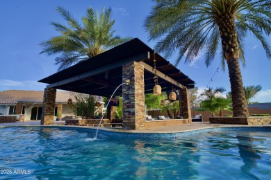 This tropical backyard oasis is a true showstopper! An oversized on Kokopelli Golf Course in Arizona - for sale on GolfHomes.com, golf home, golf lot