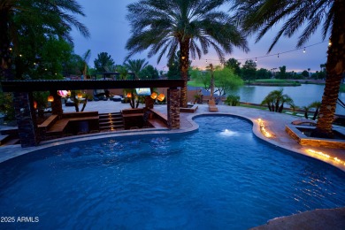 This tropical backyard oasis is a true showstopper! An oversized on Kokopelli Golf Course in Arizona - for sale on GolfHomes.com, golf home, golf lot