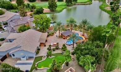 This tropical backyard oasis is a true showstopper! An oversized on Kokopelli Golf Course in Arizona - for sale on GolfHomes.com, golf home, golf lot