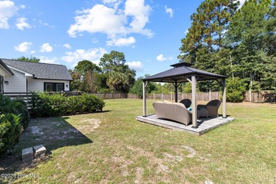 Modern Coastal Living Just Minutes from Wrightsville Beach on Inland Greens Golf Course in North Carolina - for sale on GolfHomes.com, golf home, golf lot