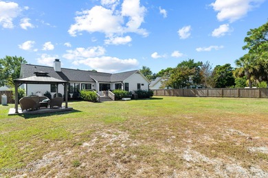 Modern Coastal Living Just Minutes from Wrightsville Beach on Inland Greens Golf Course in North Carolina - for sale on GolfHomes.com, golf home, golf lot