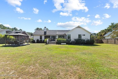 Modern Coastal Living Just Minutes from Wrightsville Beach on Inland Greens Golf Course in North Carolina - for sale on GolfHomes.com, golf home, golf lot