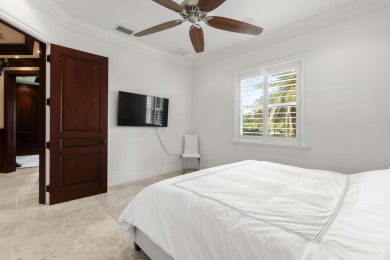 Seven bedrooms total, 5458 square feet on 1.04 acres with 5 on Sherbrooke Golf and Country Club in Florida - for sale on GolfHomes.com, golf home, golf lot