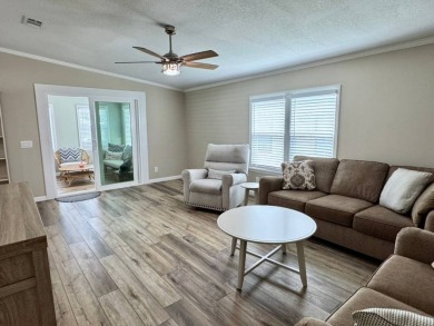 Beautifully Remodeled Home in a Resort-Style - ALL AGE on Silver Dollar Golf and Trap Club in Florida - for sale on GolfHomes.com, golf home, golf lot