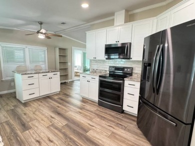Beautifully Remodeled Home in a Resort-Style - ALL AGE on Silver Dollar Golf and Trap Club in Florida - for sale on GolfHomes.com, golf home, golf lot
