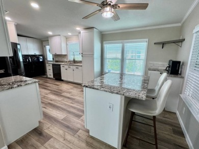 Beautifully Remodeled Home in a Resort-Style - ALL AGE on Silver Dollar Golf and Trap Club in Florida - for sale on GolfHomes.com, golf home, golf lot
