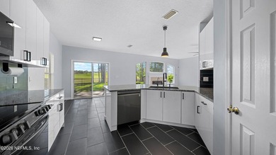 Move-in ready home with fresh interior paint and a fully on Golf Club At Fleming Island in Florida - for sale on GolfHomes.com, golf home, golf lot