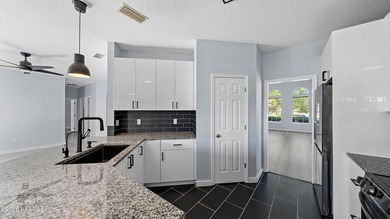 Move-in ready home with fresh interior paint and a fully on Golf Club At Fleming Island in Florida - for sale on GolfHomes.com, golf home, golf lot