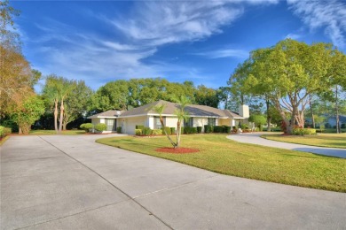 Discover this well-maintained 3-bedroom, 2.5-bath home on Cypresswood Golf and Country Club in Florida - for sale on GolfHomes.com, golf home, golf lot