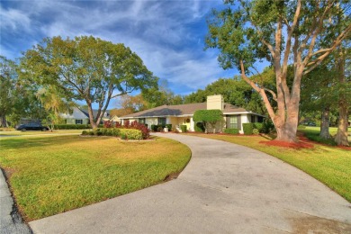 Discover this well-maintained 3-bedroom, 2.5-bath home on Cypresswood Golf and Country Club in Florida - for sale on GolfHomes.com, golf home, golf lot