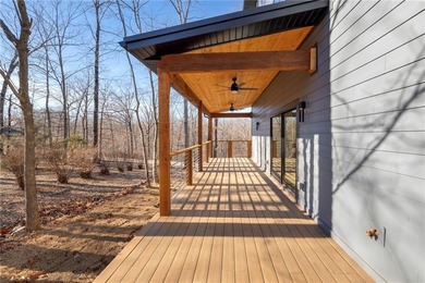 Welcome to a brand new, striking contemporary home! Thoughtfully on Branchwood Golf Course in Arkansas - for sale on GolfHomes.com, golf home, golf lot