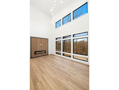 Welcome to a brand new, striking contemporary home! Thoughtfully on Branchwood Golf Course in Arkansas - for sale on GolfHomes.com, golf home, golf lot