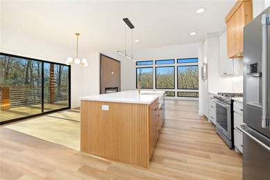 Welcome to a brand new, striking contemporary home! Thoughtfully on Branchwood Golf Course in Arkansas - for sale on GolfHomes.com, golf home, golf lot