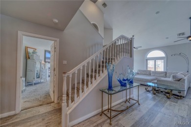 This stunning 1.5-story home offers 4 bedrooms and 2.5 bathrooms on Chaparral Golf and Country Club in Arizona - for sale on GolfHomes.com, golf home, golf lot