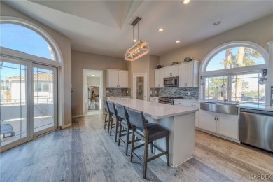 This stunning 1.5-story home offers 4 bedrooms and 2.5 bathrooms on Chaparral Golf and Country Club in Arizona - for sale on GolfHomes.com, golf home, golf lot