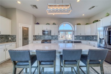 This stunning 1.5-story home offers 4 bedrooms and 2.5 bathrooms on Chaparral Golf and Country Club in Arizona - for sale on GolfHomes.com, golf home, golf lot