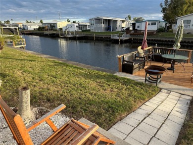 Watch the manatee and dolphin from your dock!!!  This home on Mangrove Bay Golf Course in Florida - for sale on GolfHomes.com, golf home, golf lot