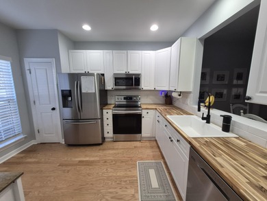 Beautiful two story condo in popular Ellington Woods Dunes West on Dunes West Golf Club in South Carolina - for sale on GolfHomes.com, golf home, golf lot